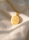 Load image into Gallery viewer, Back view of a pet memorial necklace with custom engraving options for remembrance
