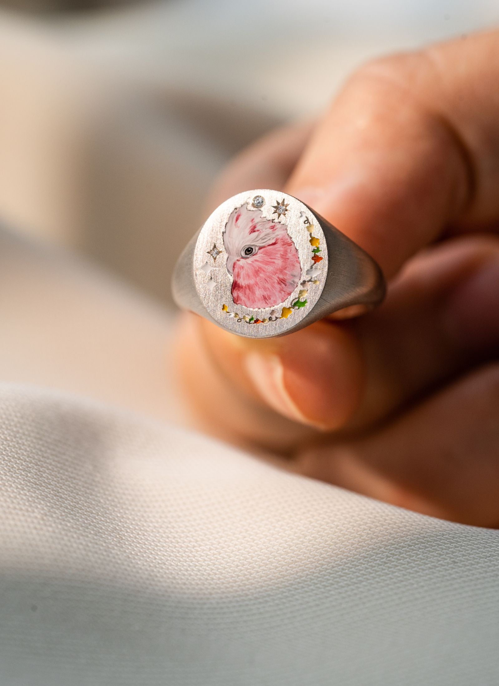 Sterling silver hand-painted pet memorial ring with custom pet portrait and engraving options